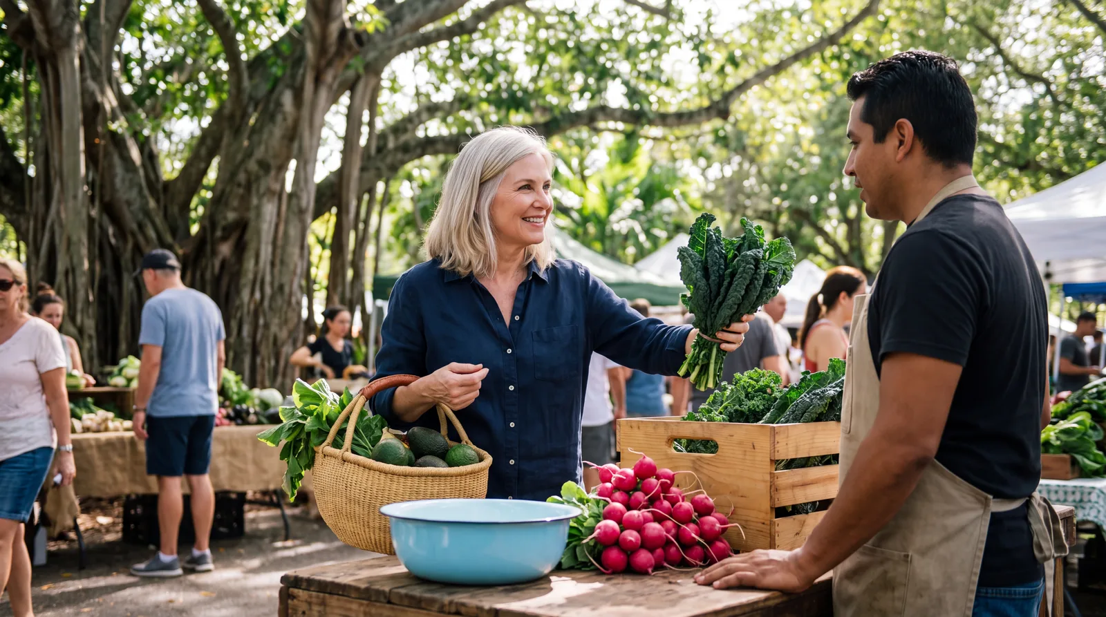 Woman in her fifties choosing fresh vegetables at a Coconut Grove farmers market
