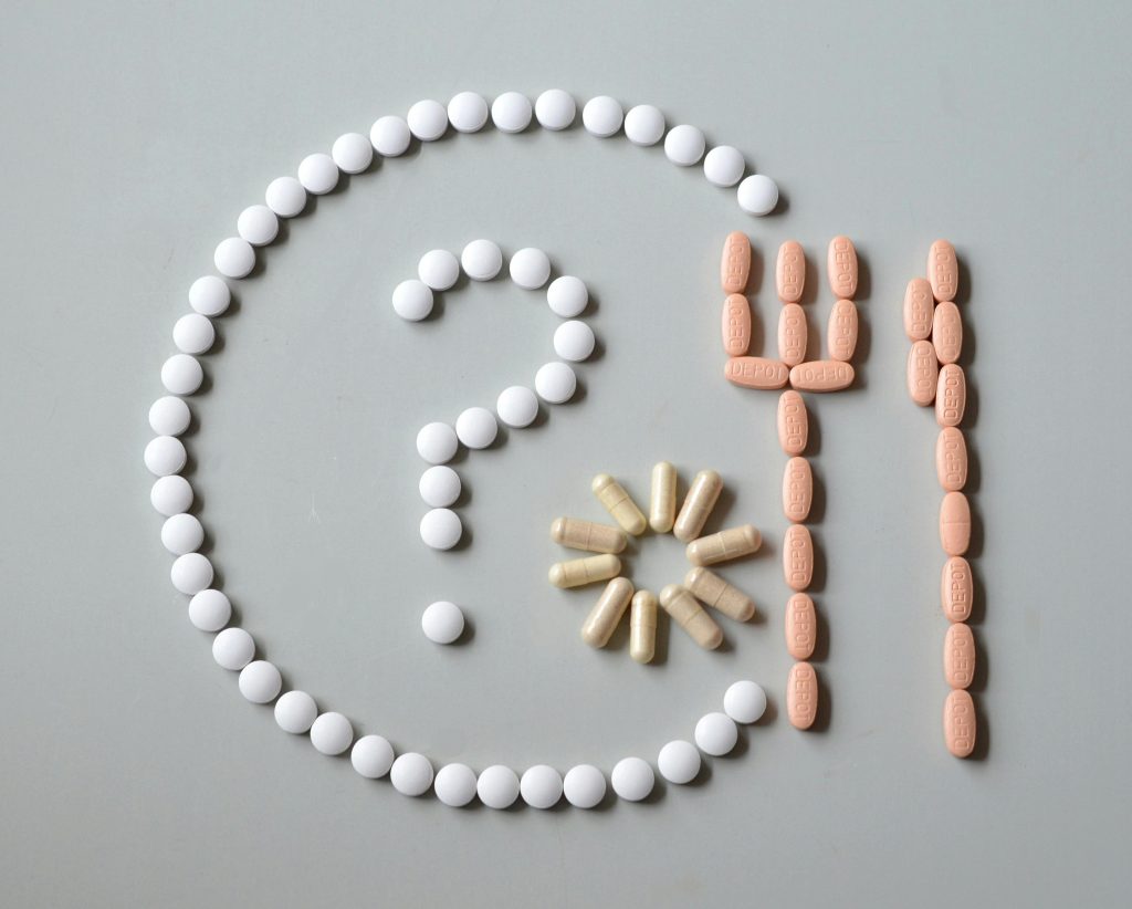 An image of a questions mark made of pills